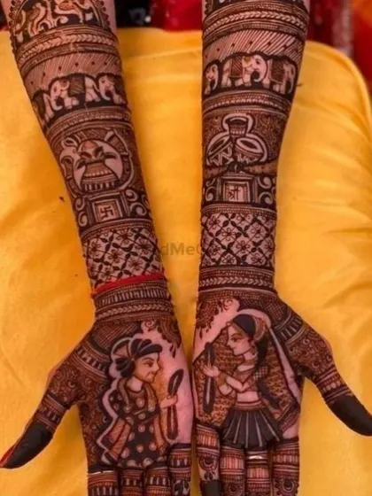 This design features the bride and groom exchanging garlands (varmala ceremony) on the palms, with traditional wedding symbols like the kalash and swastika on the arms.