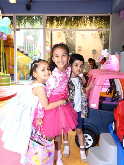 Friends celebrating together at a Peppa Pig party. Our space is perfect for hosting your child's entire group of friends.