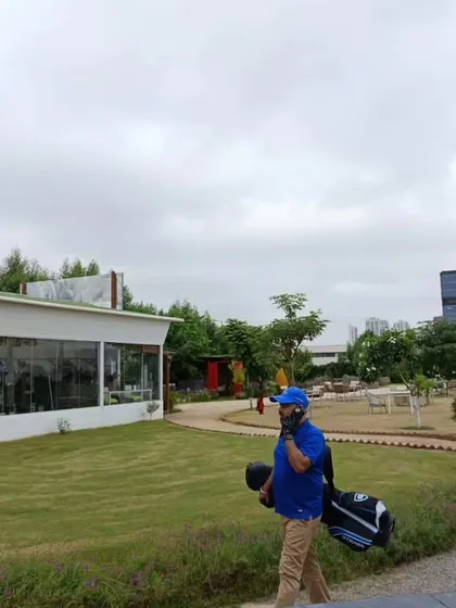 A view of our facility, showing the main building and the expansive green space that makes our range feel like a true escape.