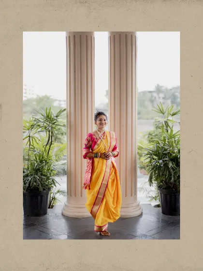 A classic, framed portrait of the bride, capturing her elegance and the beauty of her traditional Maharashtrian attire.