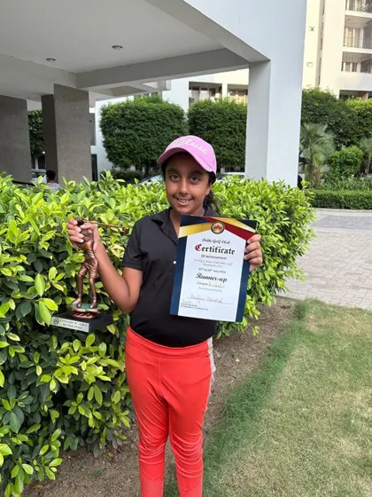 Aadya Kaushal proudly holds her Runner-Up trophy from the 15th DGC Junior/Sub-Junior Golf Tournament.