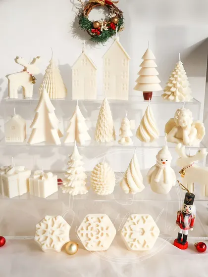 My 'White Christmas' collection, featuring over 20 different designs of trees, houses, snowflakes, and characters, all in a beautiful ivory wax.