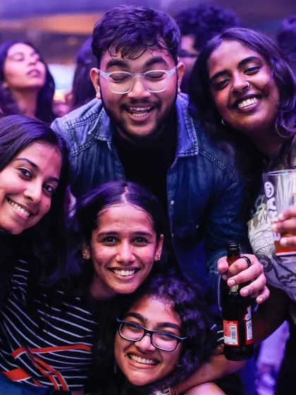 A tight-knit group of friends taking a selfie. These are the memories that last a lifetime.