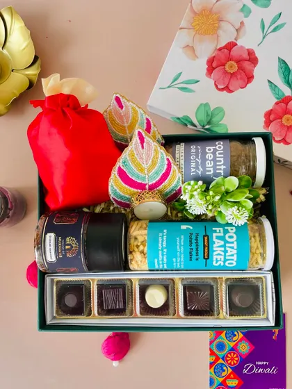 We can mix and match items to suit your preference. This version includes a red potli bag for a pop of color.