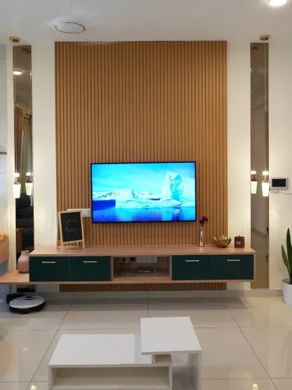 Simple yet stylish, this TV unit blends functionality with modern design. Vertical wooden paneling adds warmth, while sleek green cabinets provide storage with a pop of color.