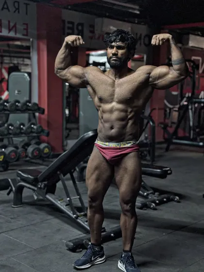 This is the result of years of consistency. A shredded, strong physique built naturally. This isn't just for show; it's the standard of excellence I bring to my own training and to yours. Ready for war.