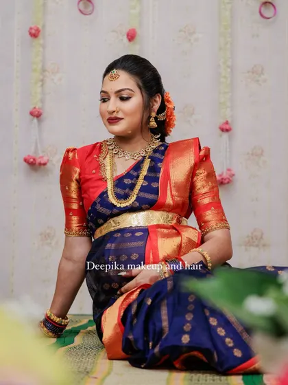 Another beautiful pose from the baby shower, highlighting the traditional jewelry and glowing makeup.