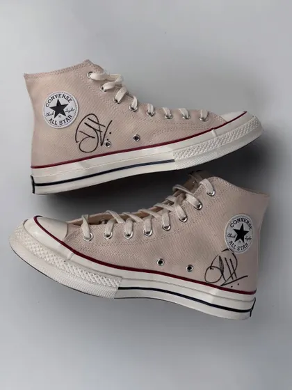 The finished pair of Converse high-tops, signed by Hardik Pandya. The clean design features his signature, making it a prized piece in our collection of celebrity collaborations.