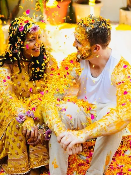 A beautiful, candid shot of the couple during their phoolon ki holi. This is a perfect example of how I plan intimate, fun-filled events that result in stunning, natural photographs.