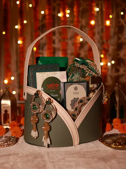 Another look at the stunning Diwali hamper for Yatra, showcasing the beautiful traditional earrings and curated items inside.