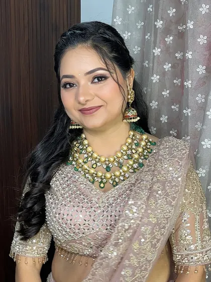 I'm always up for a soft glam look. This client looks so elegant with her smokey brown eyes, nude lips, and a beautiful braided hairstyle for her engagement function.
