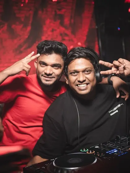 Good vibes in the DJ booth. Sharing a moment with a friend during a set. The energy is always better when you're surrounded by your squad.