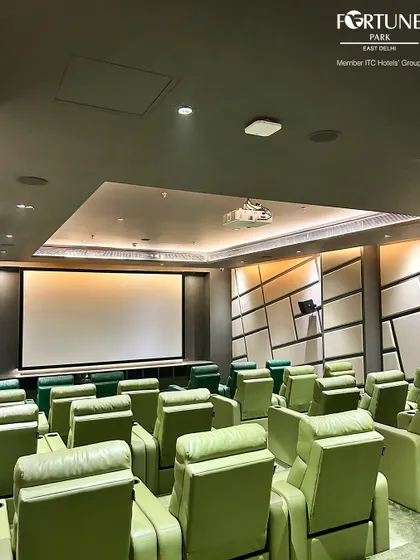Here is a view of our 31-seat private theatre, facing the expansive 200-inch screen. The room is acoustically treated and features a state-of-the-art Dolby sound system, creating an environment where every scene is felt, not just seen.