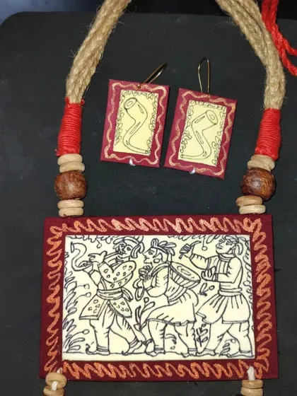 A hand-painted fabric set depicting a 'baraat' or wedding procession scene. This is a unique and thematic piece, perfect for wedding trousseaus or as a gift.