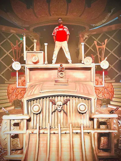 Having a 'Mad Max' moment on a massive, custom-built truck prop on a show set. Never give up.
