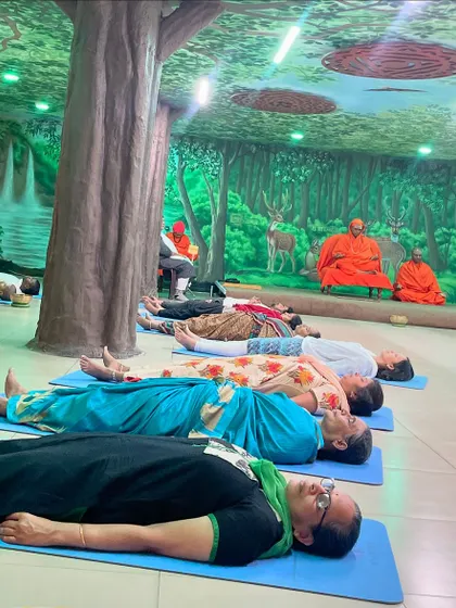 Participants resting deeply during a sound bath. The goal of these sessions is to guide people into a state between waking and sleeping, where the body's natural healing abilities are activated.