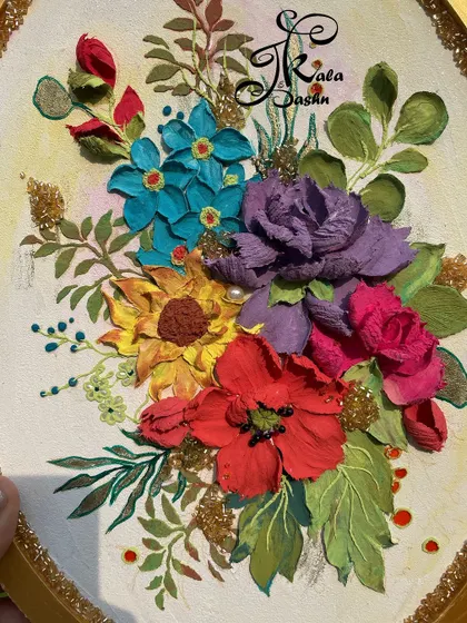 A close-up of the floral bouquet, showing the different types of flowers like sunflowers and roses.
