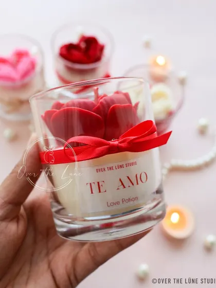 My 'Te Amo' jar candle is the perfect way to say 'I love you'. This one features a beautiful red rose heart, a custom label, and comes in my 'Love Potion' scent, ready for Valentine's Day.