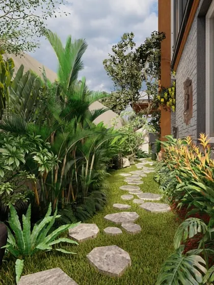 We believe a garden path should be an invitation to explore. For this villa project, we designed a winding stone pathway through a dense, tropical side yard. This approach turns a simple walkway into a journey, creating a sense of discovery and making the garden feel larger and more immersive.
