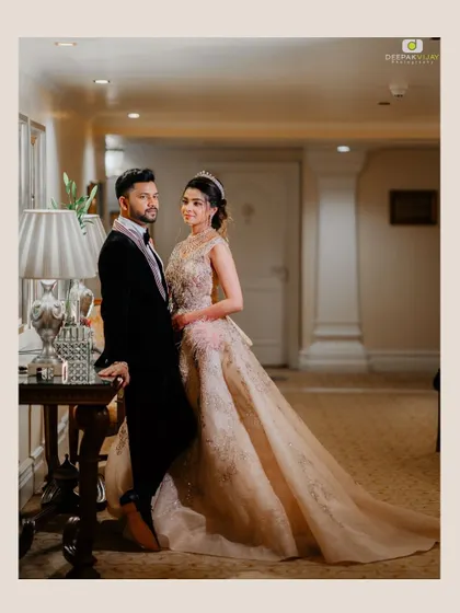 A beautiful candid style photo of the couple. Aishwarya's makeup looks fresh and radiant, proving that a glamorous look can also feel natural and comfortable.