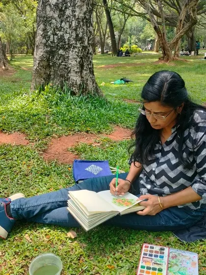 Another shot of me sketching at Cubbon Park, surrounded by the quiet beauty of the trees.