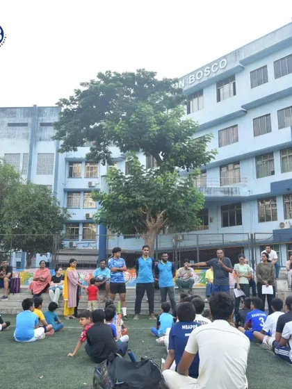 An overview of our grand opening event at Don Bosco, Nerul. A large group of students and parents gather to listen to our coaches and guests, showcasing strong community engagement.