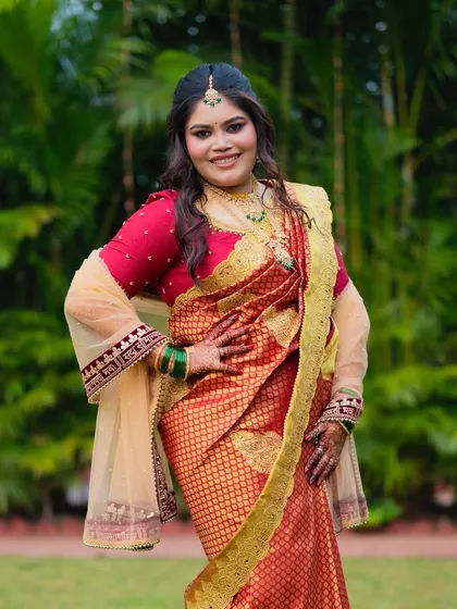 The full look, showcasing the beautiful saree and soft open curls. A perfect blend of tradition and modern styling.