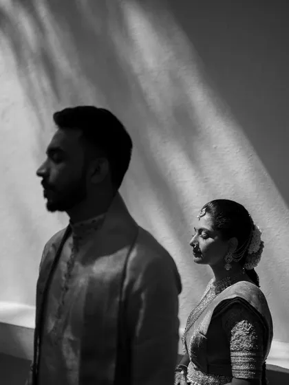 We believe in the power of artistic expression. This black and white portrait of Vinitha and Dhanush uses shadow and light to create a moody, timeless image that feels both classic and modern.