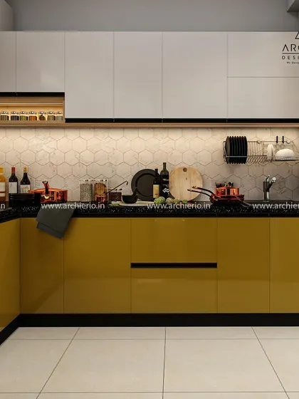 A vibrant kitchen with mustard yellow lower cabinets and white upper cabinets. The hexagonal tile backsplash adds a modern, geometric pattern to the space.