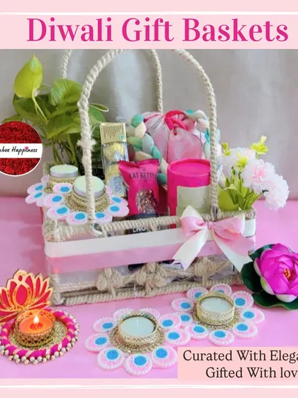 This basket, curated with elegance and gifted with love, includes a plant, snacks, and beautiful lotus-themed diyas.