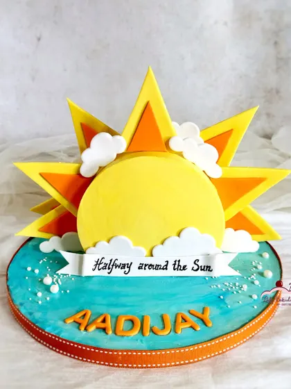 Halfway around the sun! A fun and unique 6-month birthday cake with a bright, shining sun.