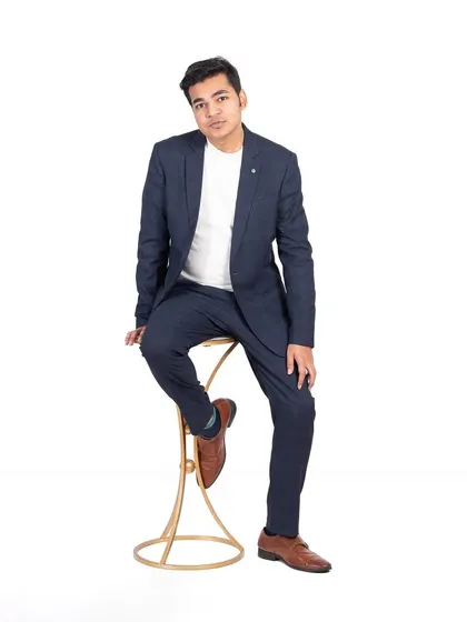 A clean and modern professional headshot perfect for a corporate profile or LinkedIn. Shot against a pure white studio background, this style provides a sharp, distraction-free image that conveys confidence and approachability.