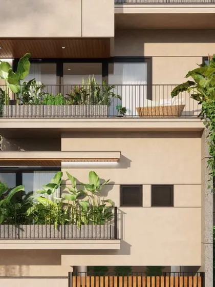 This facade design for a compact plot integrates a vibrant tropical landscape across multiple levels, softening the structure and enhancing its connection to the outdoors.