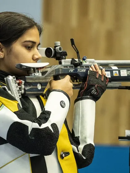 A shooter from Team India takes aim during the ISSF World Cup. The focus and technique on display are what we strive to instill in our own athletes.