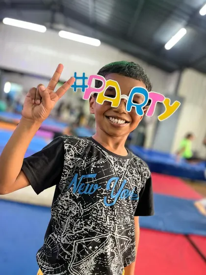 A huge, happy grin from one of our party animals. The joy is real and contagious.