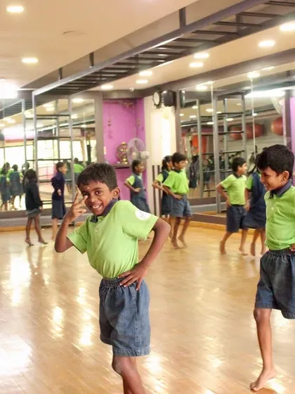 Striking a pose. The boys in our outreach program learn about posture and confidence through fun and engaging dance exercises.