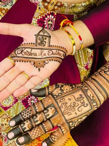 Mehndi for the groom. This design features the phrase 'Krishna Ka Dulha' (Krishna's Groom) with a Ganesha motif for good luck, a perfect and simple design for the groom's hand.