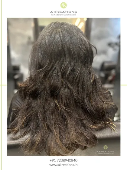 The "before" shot, showing hair ready for a striking auburn chestnut transformation.