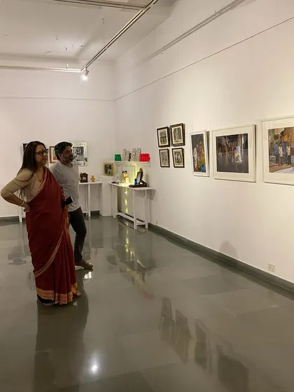 Ina Puri in conversation while viewing the artworks.