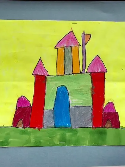 Here is a closer look at the finished castle artwork. The use of bright, bold colors and distinct shapes demonstrates the core techniques learned in our preschool art classes.