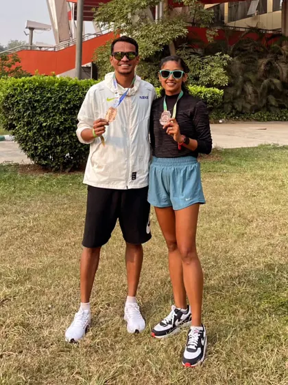 Behind every fearless athlete is a fearless coach. A post-race photo with my training partner, celebrating our shared success.