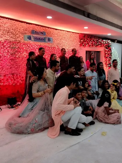A beautiful family portrait on stage after the naming ceremony is complete. These are the moments that everyone will cherish for years to come.