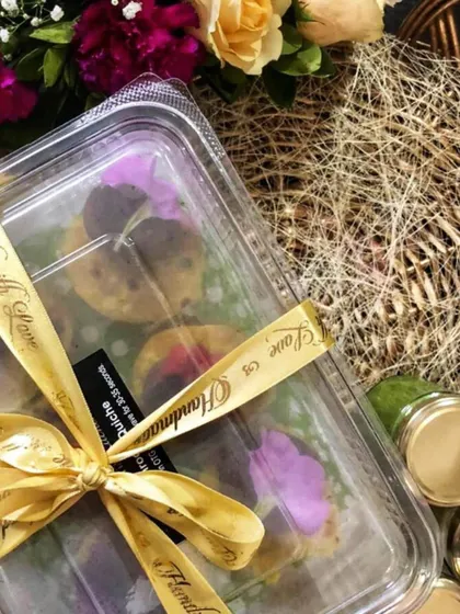 An exquisitely packed platter of appetizers, tied with a "Handmade with Love" ribbon. This is how I ensure every delivery feels personal and special, making it an ideal gift for friends and family.