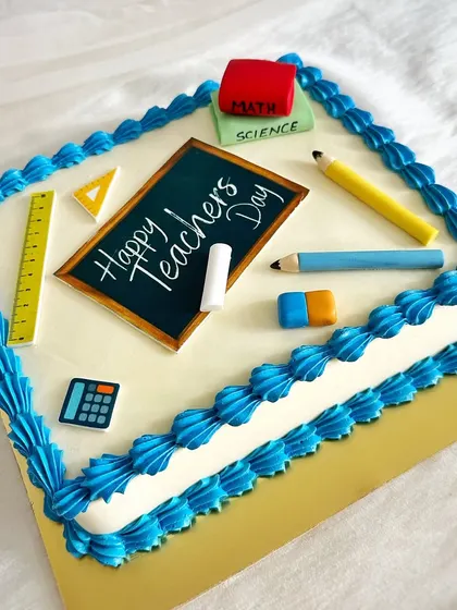 A sweet tribute for Teacher's Day, designed to look like a chalkboard with various school supplies.