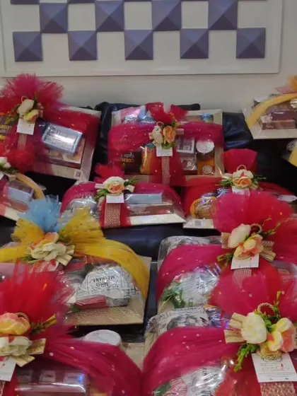 An assortment of wedding hampers ready for a client. I offer various color schemes, like red and yellow, to perfectly match the theme of the wedding celebrations.