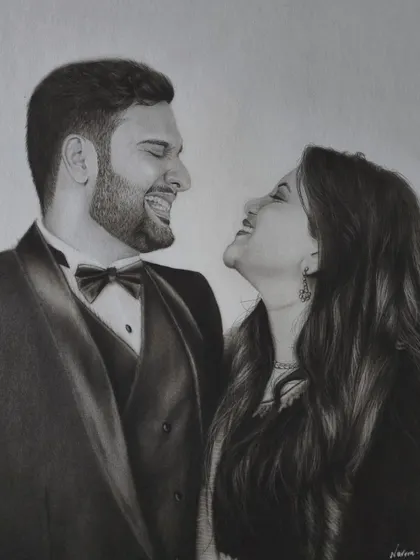 A close-up of the finished portrait, highlighting the subtle shading on the man's suit and the woman's hair.