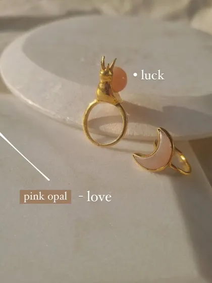 Which energy are you calling in, love or luck? Here are two of my handmade rings: the 'snáil' ring with Peach Moonstone for luck and abundance, and the 'chándra' luna ring with Pink Opal for attracting love.
