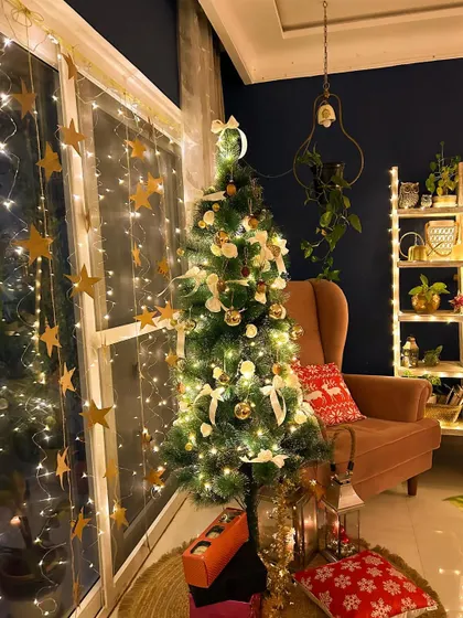The best part of this time of year is the memories we make. My Christmas corner, with the tree, the wingback chair, and lots of fairy lights.