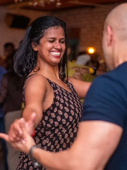 A huge, joyful smile that lights up the whole picture. This is the happiness we aim for.