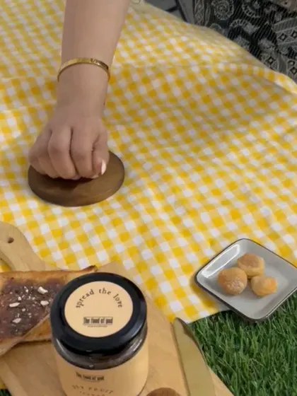 Styling the picnic scene for The Food of God's Dry Fruit Spread.